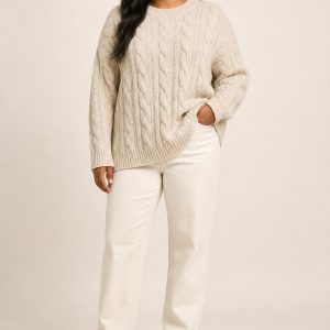 Women's Oatmeal Cable Sweater worn with an adult model