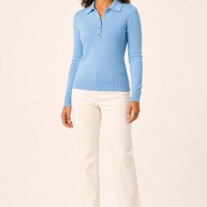 Women's Sky Polo Sweater worn with an adult model