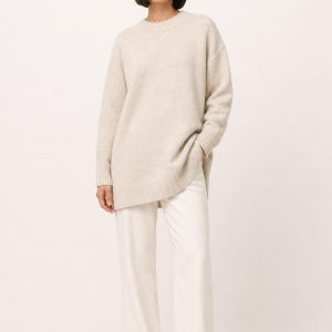 Women's Oatmeal Tunic Sweater worn with an adult model