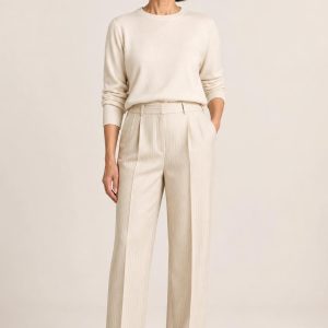Women's Cream Fine Stripe Pleated Trousers worn with an adult model