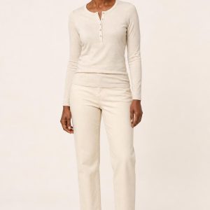 Women's Oatmeal Henley Tee worn with an adult model