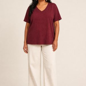Women's Burgundy Tonal Texture V-Neck Tee worn with an adult model