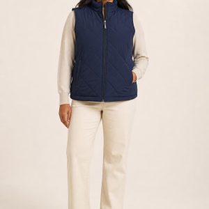 Women's Navy Quilted Vest worn with an adult model