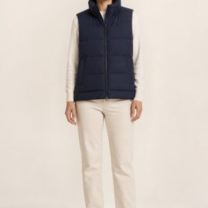 Women's Navy Puffer Vest worn with an adult model