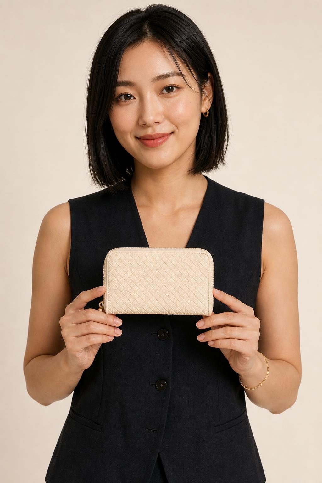 Women's Ivory Zip Wallet shown with an adult model